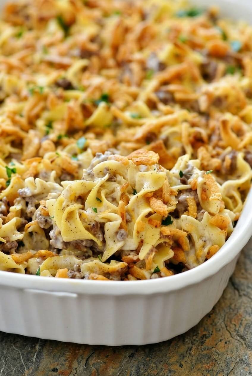 french onion beef casserole recipe - French Onion Beef Casserole served in a white bowl overhead view
